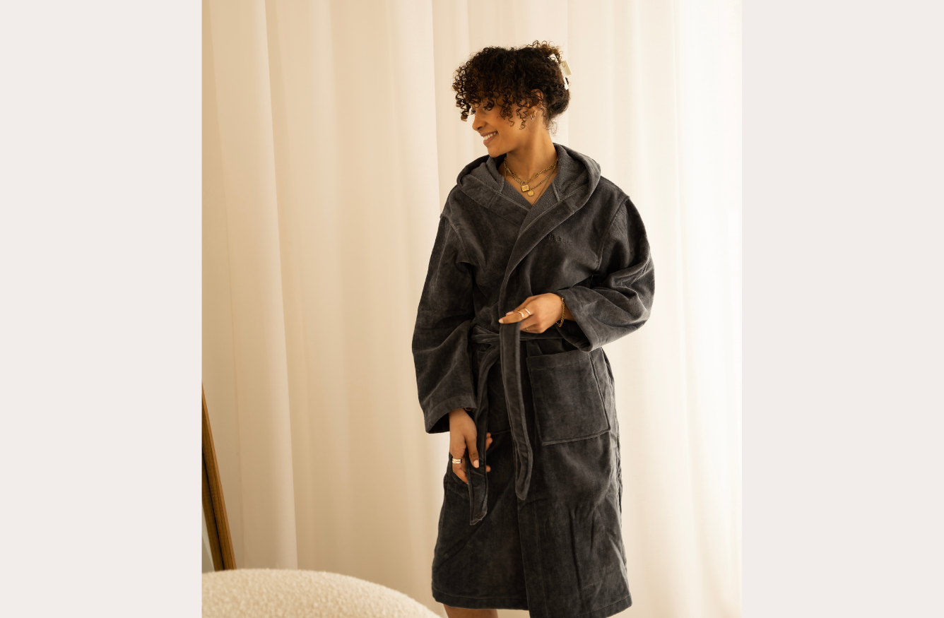 Model wearing the Tubble grey robe, showing the fit and fabric texture