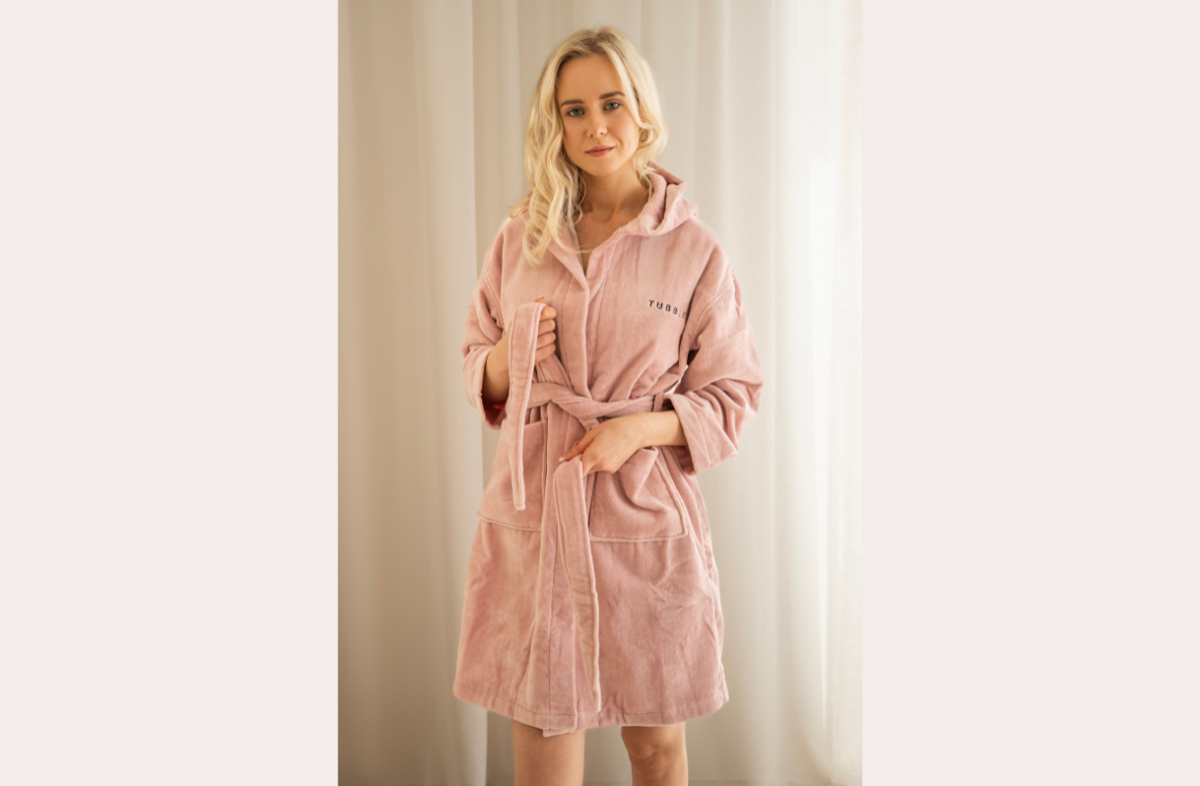 Tubble pink bathrobe worn by model, showing fit and soft fabric texture