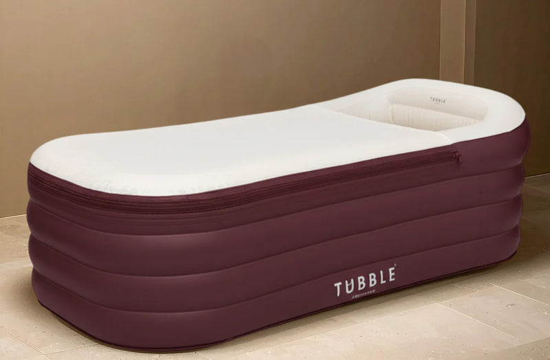 Inflatable bed with maroon and white design on a white background