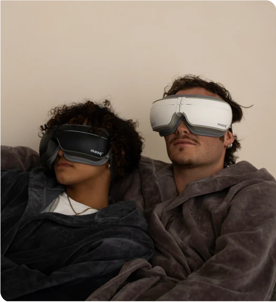 Two people relaxing with Tubble eye massager goggles designed for stress and eye fatigue relief.